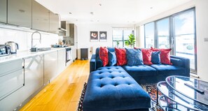 FURNISHED KITCHEN AND LIVING AREA