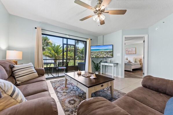 Large 55" flat screen TV to enjoy with family. Master pictured in background.