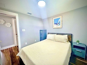 second bedroom with queen size bed