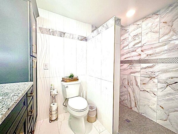 full bathroom with walk in shower