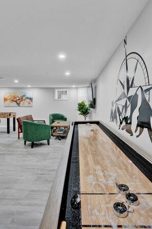 Game room with Shuffle board