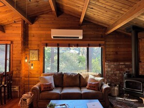 Living Room with a newly installed a/c unit