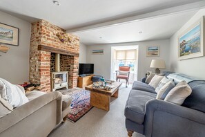 sitting room with wood burner