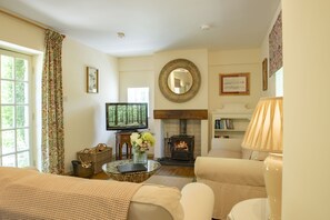 The Old Potting Shed, Egton, near Whitby: Sitting room with wood burning stove