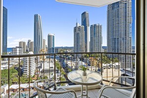 Enjoy your morning coffee in this balcony with the city and the ocean views