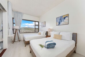 Bedroom with queen-size and full-size beds plus great mountain views from the window