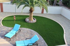 Lounge chairs viewed from the balcony.