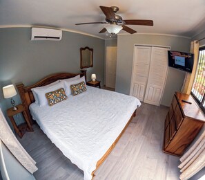 Master bedroom has access to a private balcony , AC and TV 