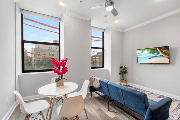 Modern furnished living room and a lovely dinner to compliment.