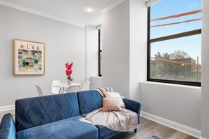 Cozy and welcoming living area with ample seating and a warm, homey atmosphere.