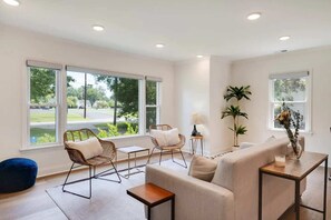 Living Room: Cozy Family Room - Gather with loved ones in this comfortable and inviting living room, perfect for family time.