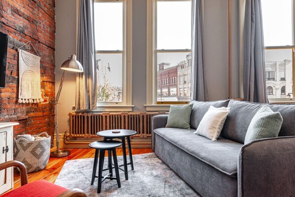 Indulge in Spacious Luxury: Our living room, designed for both comfort and elegance, awaits your arrival. Located in the heart of Stratford, close to the festival and downtown's vibrant scene, it’s where luxury meets convenience