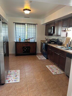Kitchen with pots pans and utensils