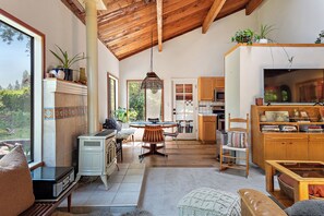 A nearly open floorplan from the entry and living area to the dining space and kitchen.