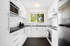 The newly renovated kitchen has everything that’s needed to cook meals at home. 

