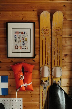 Vintage decor and local artisan artwork plays off the theme of the cabin.