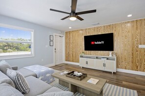 Cozy and simple living space in Cocoa Beach — perfect for relaxing with YouTube TV and a good cup of coffee.