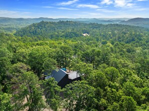 Once Upon A View sits on some foothill mountains in the Ouachita National Forest.