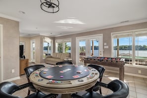 Poker table, foosball, darts, karaoke, board games, books
