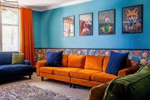 Ample comfortable seating, Smart TV overlooking the Green
