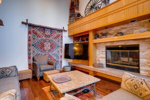 Kick back your feet and relax in the cozy living area.