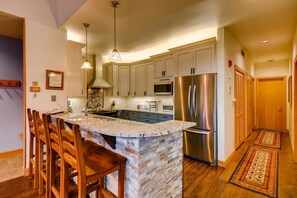 Take a seat at the breakfast bar.