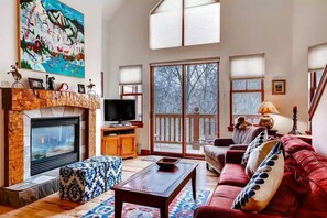 Kick back your feet and relax in the spacious, bright living room.