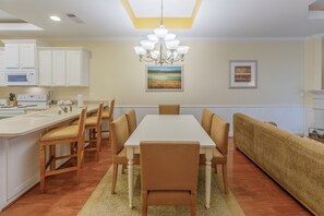 Loads of room at the dining table and the open-concept is always nice for the cook.