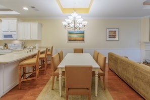 Loads of room at the dining table and the open-concept is always nice for the cook.