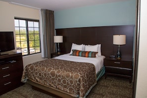 Relax on the comfy bed after a day outside.