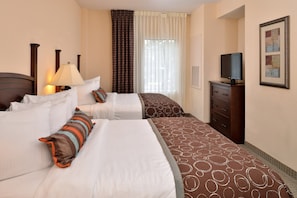 Get a good night's rest in the cozy bedroom.