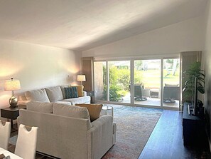 Living room has great views and plenty of seating