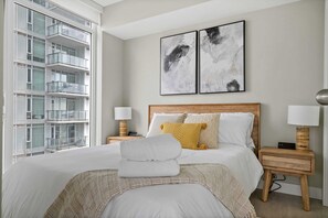 Sleep comfortably on the plush Endy Queen bed. Brand-new sleep masks are provided for your relaxation and comfort. 