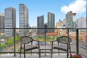 Enjoy a hot summer day relaxing on the large balcony overlooking downtown with amazing views of the Calgary Tower!