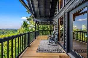 Relax in the peaceful rocking chairs overlooking beautiful Smoky Mountain views.