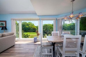 large windows with beautiful golf view