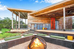 Sunk in styled firepit area
