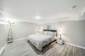 The spacious front bedroom with king bed, with accessible height.