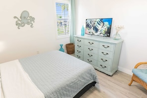 This bedroom has a Smart TV.