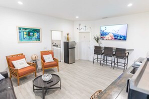 Our living room with a Smart TV so you can keep up with your favorite shows.