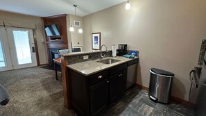 "Sink","Sink Faucet","Floor","Chair","Painting"