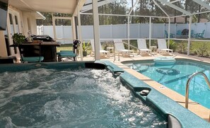 Imagine yourself seated in this secluded hot tub by the heated pool you enjoy.