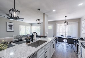Lots of space for meals at the dining table and kitchen counter