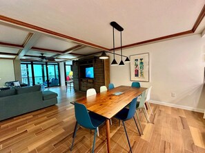 The mid-century modern dining table seats 8 comfortably.