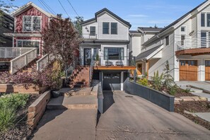 Exterior: View of front of home, garage, driveway