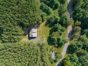 Set amongst the pines on 5 private acres