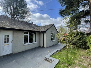 To the rear of the property is access to the hallway from the patio, where you can sit and enjoy the lovely garden