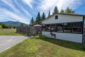 Exterior: Picturesque mountain views and a charming patio for outdoor relaxation!