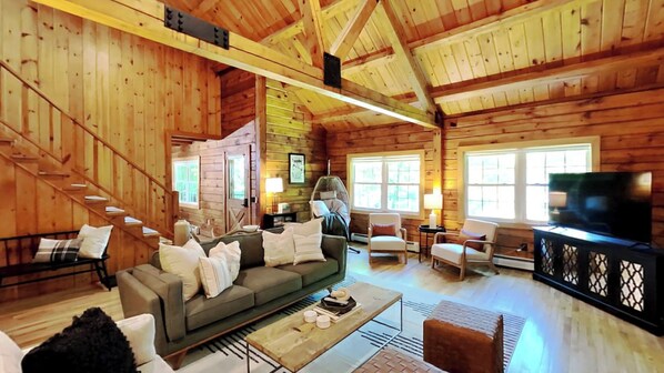 living room.  Smart TV on the right.  Be sure to bring your  passwords for streaming.