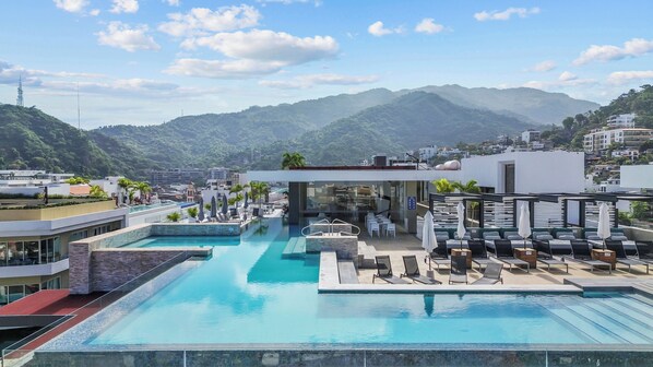 Dive into luxury at Loft 268, featuring one of the finest rooftop pools in the area